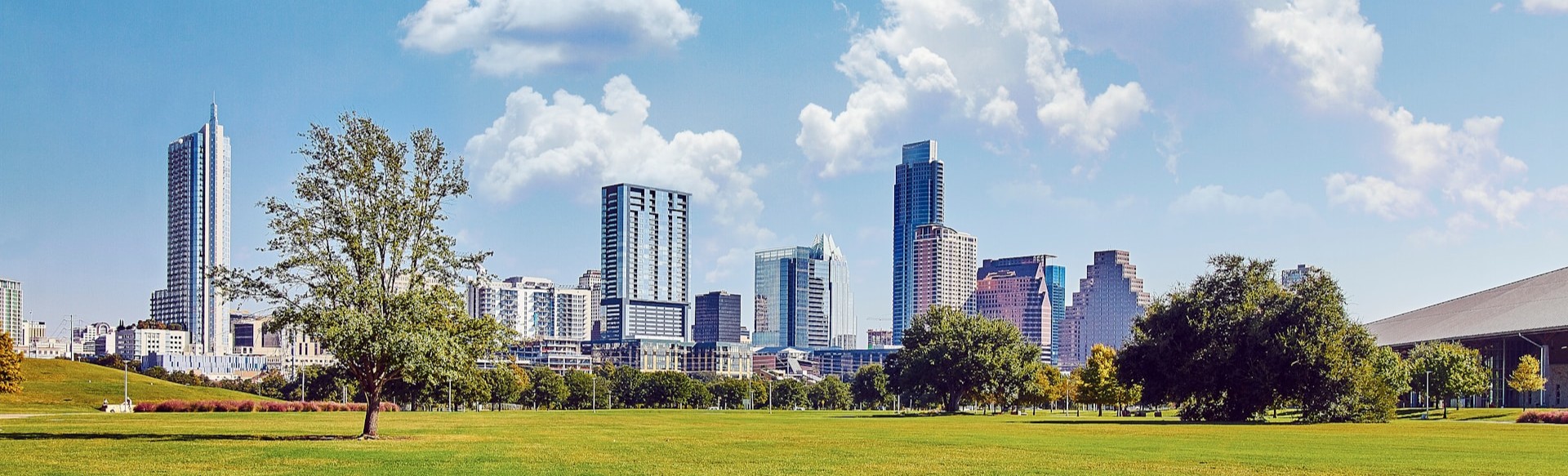 Modern commercial skyscrapers viewed from below showcasing professional real estate architecture